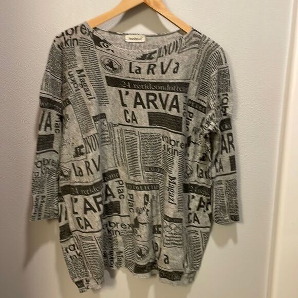 Tops - Han Belle newsprint woman’s three quarter length sleeve top